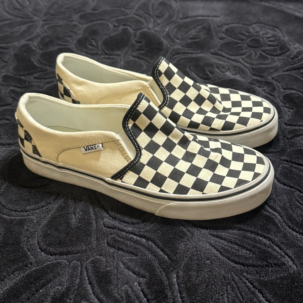 Vans Women’s Black and Cream Checkerboard Slip-On Sneakers